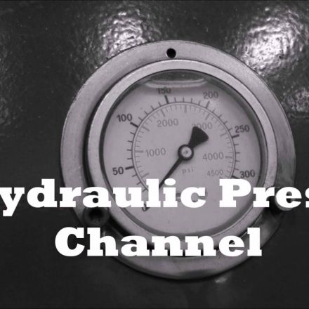 Crushing coins with hydraulic press