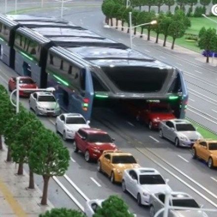 Futuristic straddling bus allows cars running underneath