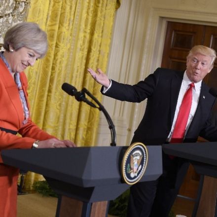 Britain's May refuses to condemn Trump refugee ban