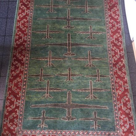 Afghanistan's carpet makers have long made "war rugs." What's the latest? Drone rugs.