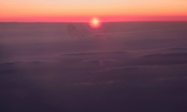 Sunset from 19,000 feet as it sinks in the west