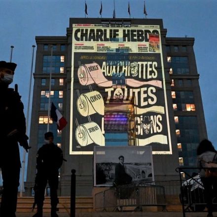 Charlie Hebdo Muhammad cartoons projected onto government buildings in defiance of Islamist terrorists