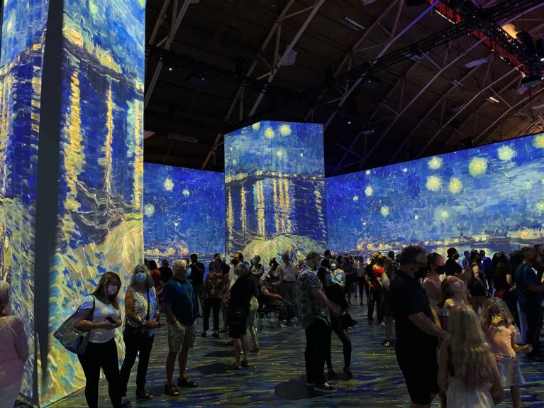Look closely. This is not The Starry Night, but rather a collection of nighttime water-themed paintings, reproduced im immersive computer animation and light..