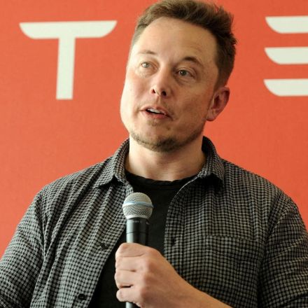 Tesla wants to split its stock so it can pay a stock dividend; shares gain