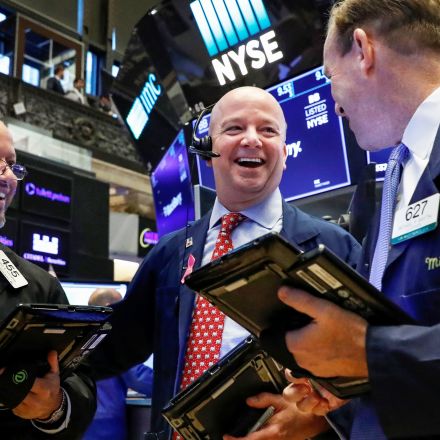 Dow jumps 240 points to all-time high as Wall Street ends record-breaking week on a high note
