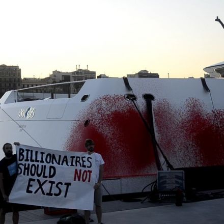 Activists spray red paint over billionaire Walmart heiress's superyacht for a second time | CNN