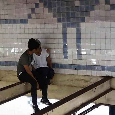 Man follows woman onto subway beam, talks her out of jumping