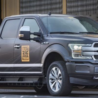 Ford shows off electric F-150 truck by towing a million pounds of train