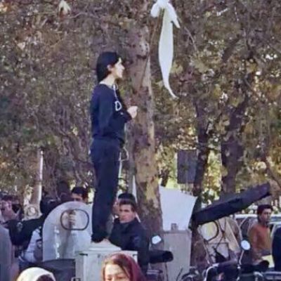 Iranian Woman Waves Hijab in Defiance, Mysteriously Disappears