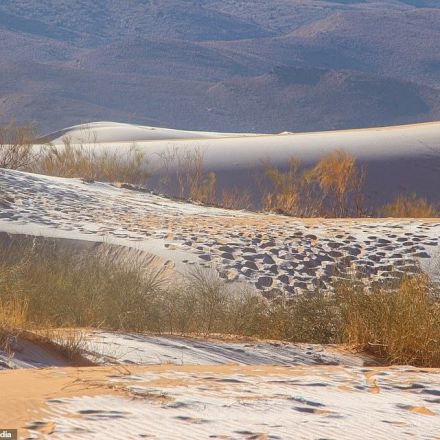 SNOW falls in the SAHARA as ice blankets the dunes