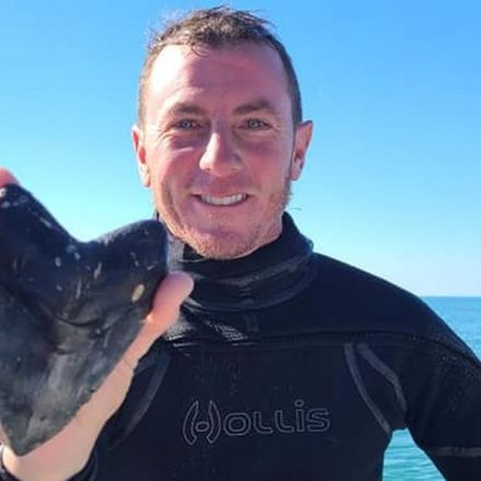 Florida diver finds giant megalodon shark tooth at sea