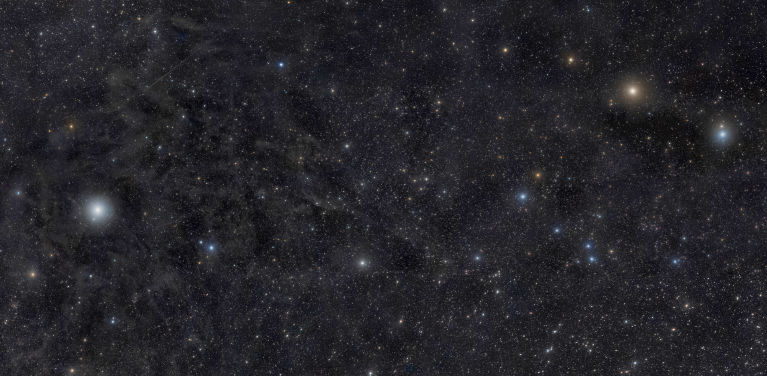 Photo by Rogelio Bernal Andreo (DeepSkyColors.com).   Kochab is the brighter orange star in the upper right while Pherkad is the dimmer bluish star. 