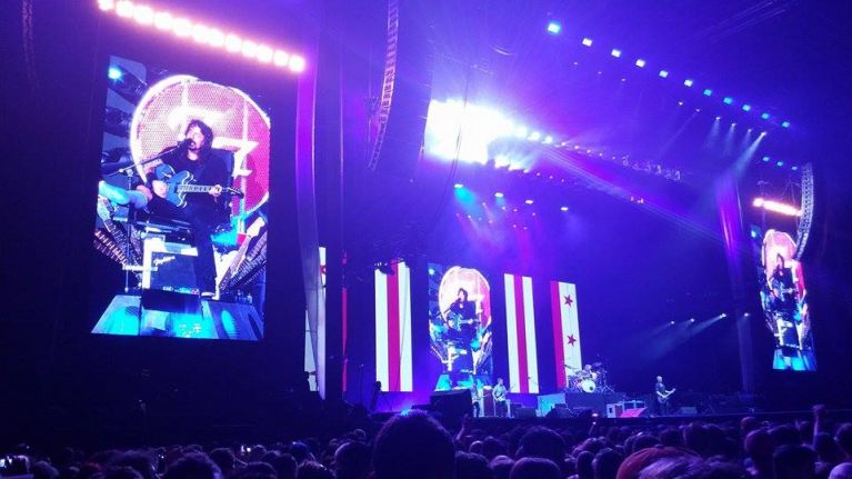 Foo Fighters perform at their 20th Anniversary show in Washington DC, with Dave Grohl sitting upon his custom built, moving throne.