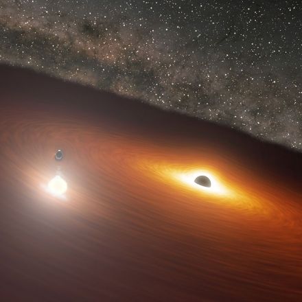 A huge black hole eats a huger black hole's dinner then explodes with the light of a trillion suns