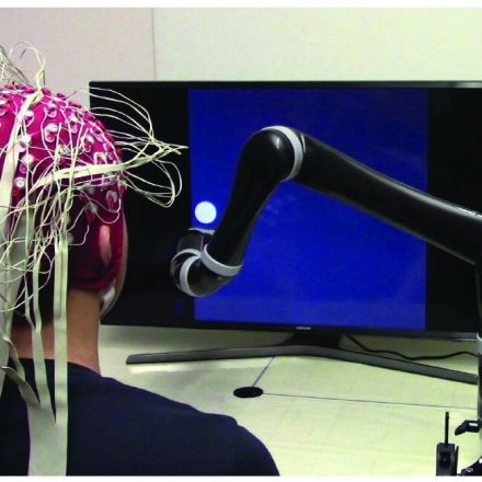 First-ever successful mind-controlled robotic arm without brain implants