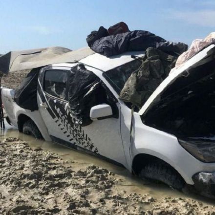 Australian fishermen rescued after sleeping on roof of stranded car 'for days' as crocodiles circled