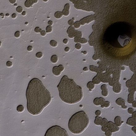 NASA Can't Explain What Made This Strange, Deep Hole on Mars