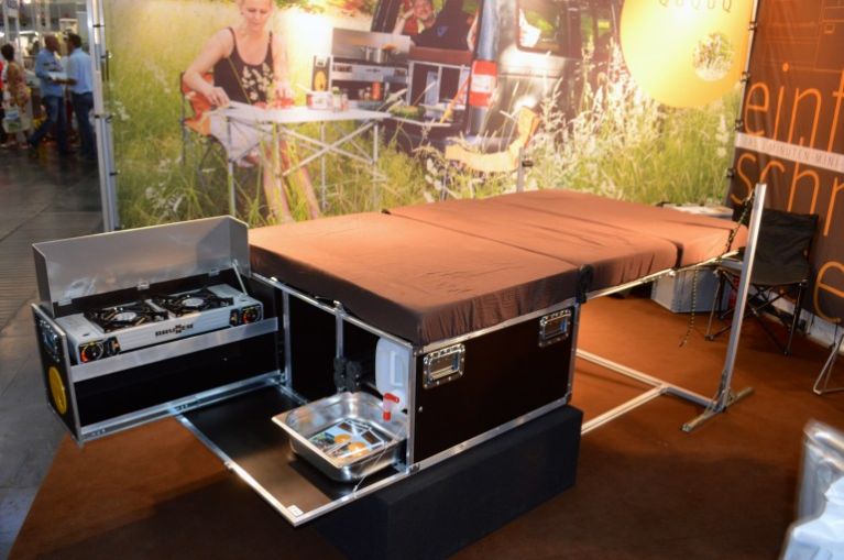 There's even more minimalist solutions! The Ququq camping box loads kitchen and sleeping equipment into a vehicle.