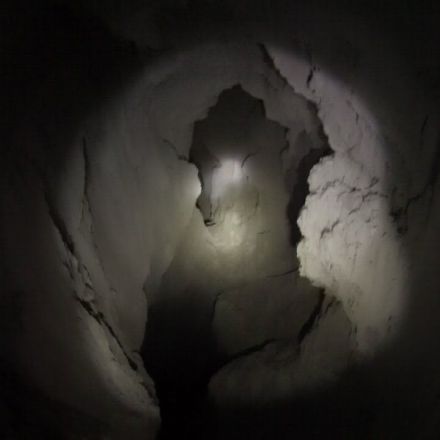 Through a 1000 feet long mud cave
