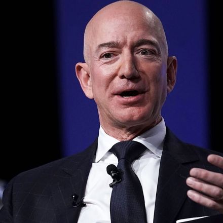 Jeff Bezos keeps a 16-year-old framed magazine as a 'reminder' that Amazon's most profitable service was once just a 'risky bet'