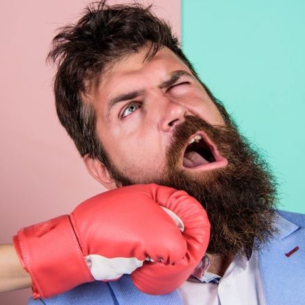 Did men's beards evolve to absorb a punch to the jaw?