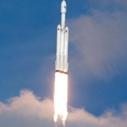 Elon Musk wants 'a new space race,' says new SpaceX rocket can launch payloads as far as Pluto