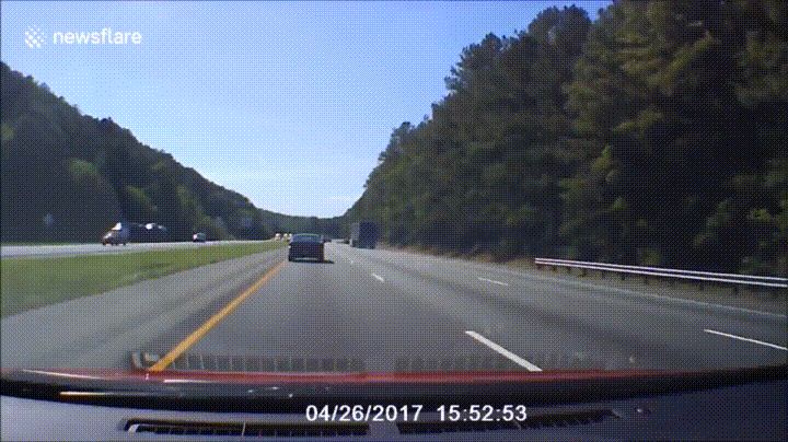 Great example of how easy a wreck can occur due to a minor distraction (watch the truck's tire).